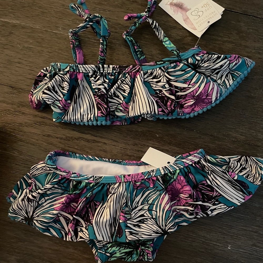 Baby girls Jessica Simpson 2 piece swimsuit.